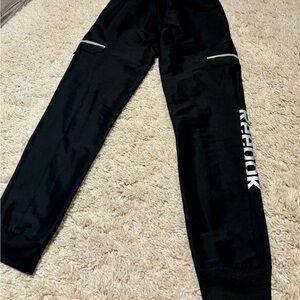 Boys black Reebok windbreaker material joggers black size L 10/12